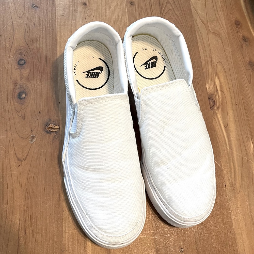 White Nike Court Legacy Slip-Ons. Size 8.5. Worn only twice!